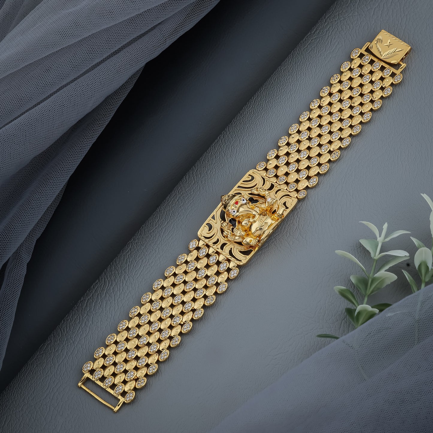 Majestic Gold Plated Bracelet with 3D Ganesh Murti and Diamond-Studded Mesh Design"