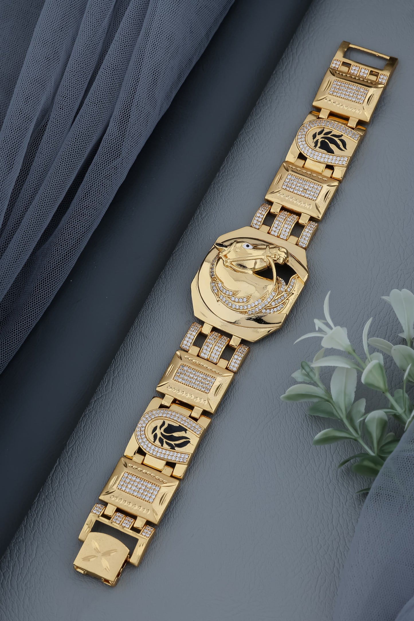 Ornate Gold Plated Bracelet with Engraved Horse Design and Studded Accents"