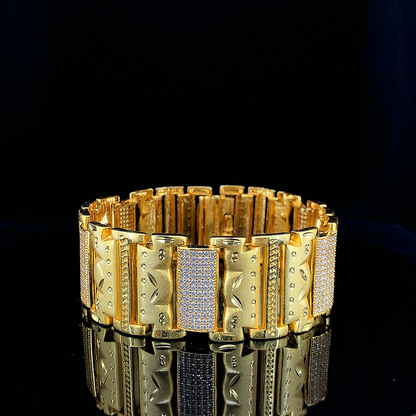 Bold Gold Plated Bracelet with Textured Panels and Diamond-Like Inlays"
