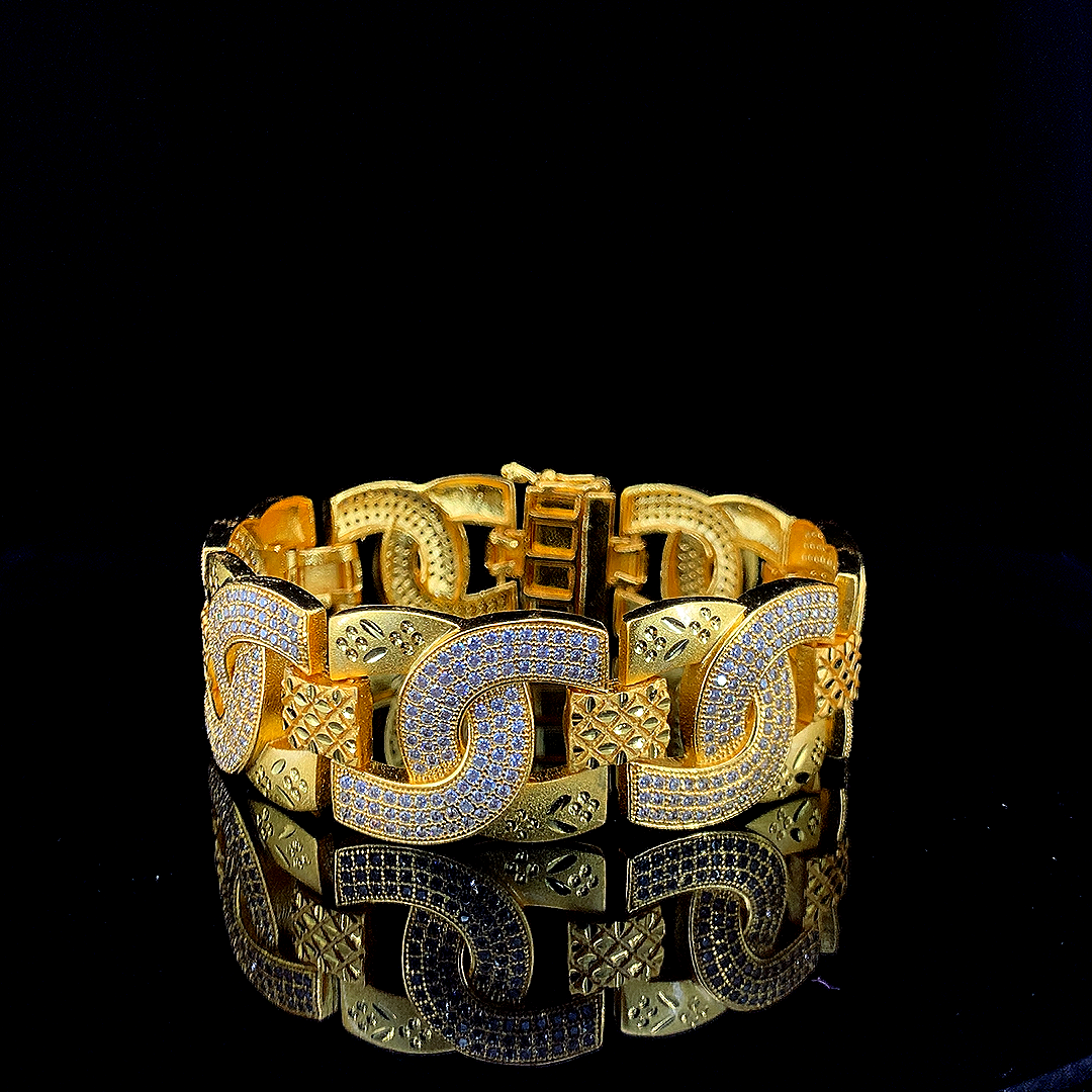 Signature Cartier Gold Plated Bracelet – Diamond-Cut Brilliance"