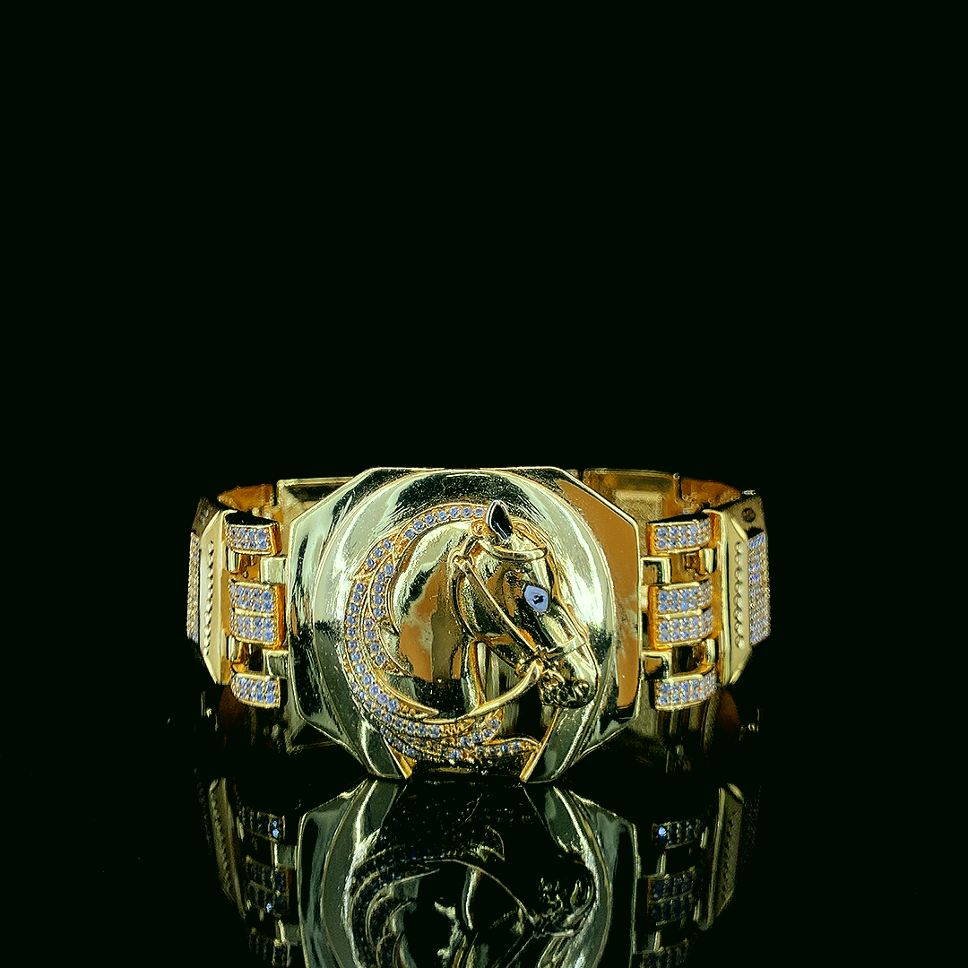 Ornate Gold Plated Bracelet with Engraved Horse Design and Studded Accents"