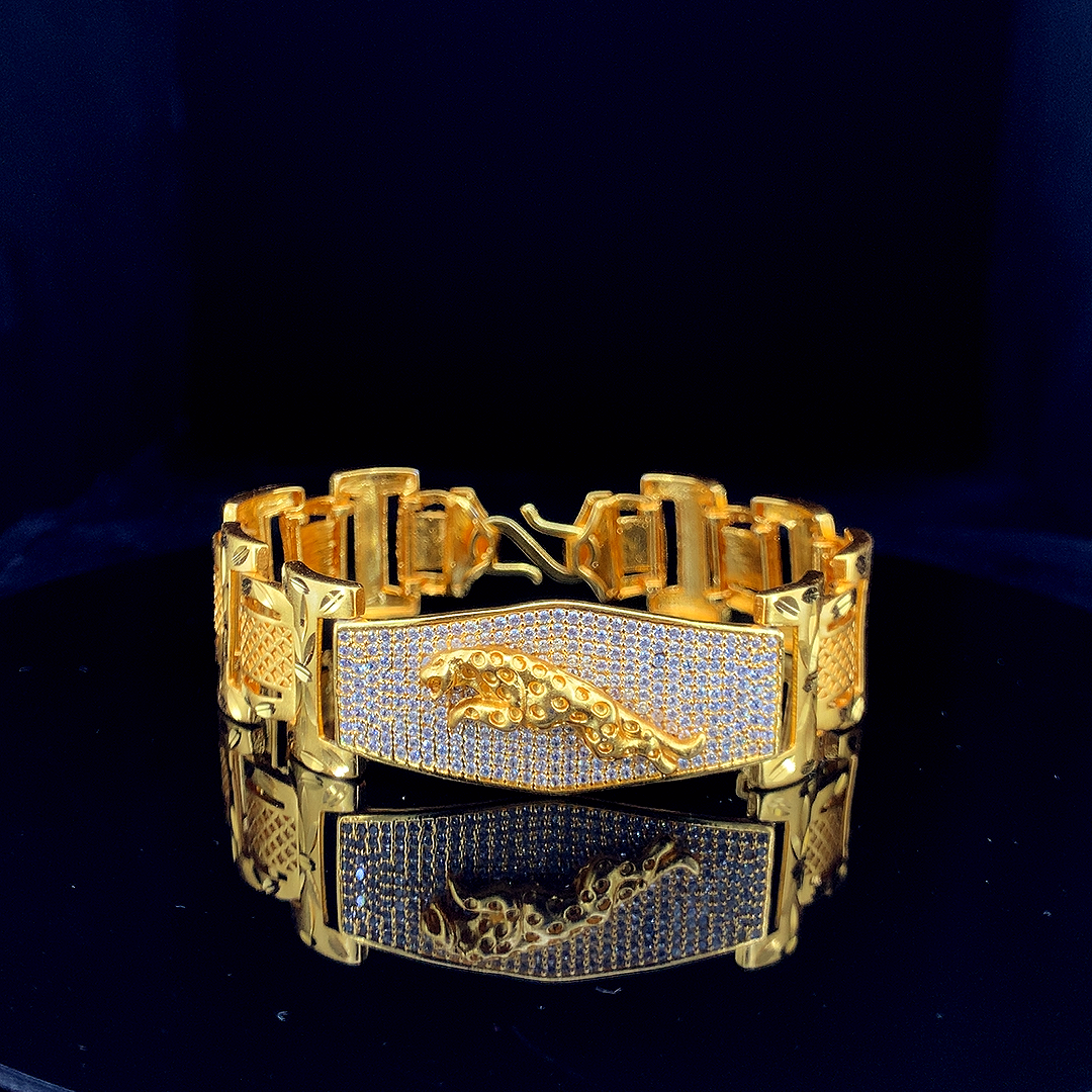 Royal Gold Plated Bracelet with Penther  Design and Diamond-Studded Chevron Links"