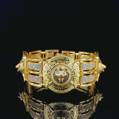 Majestic Gold Plated Bracelet Featuring Triple Lion Emblems and Studded Detailing"