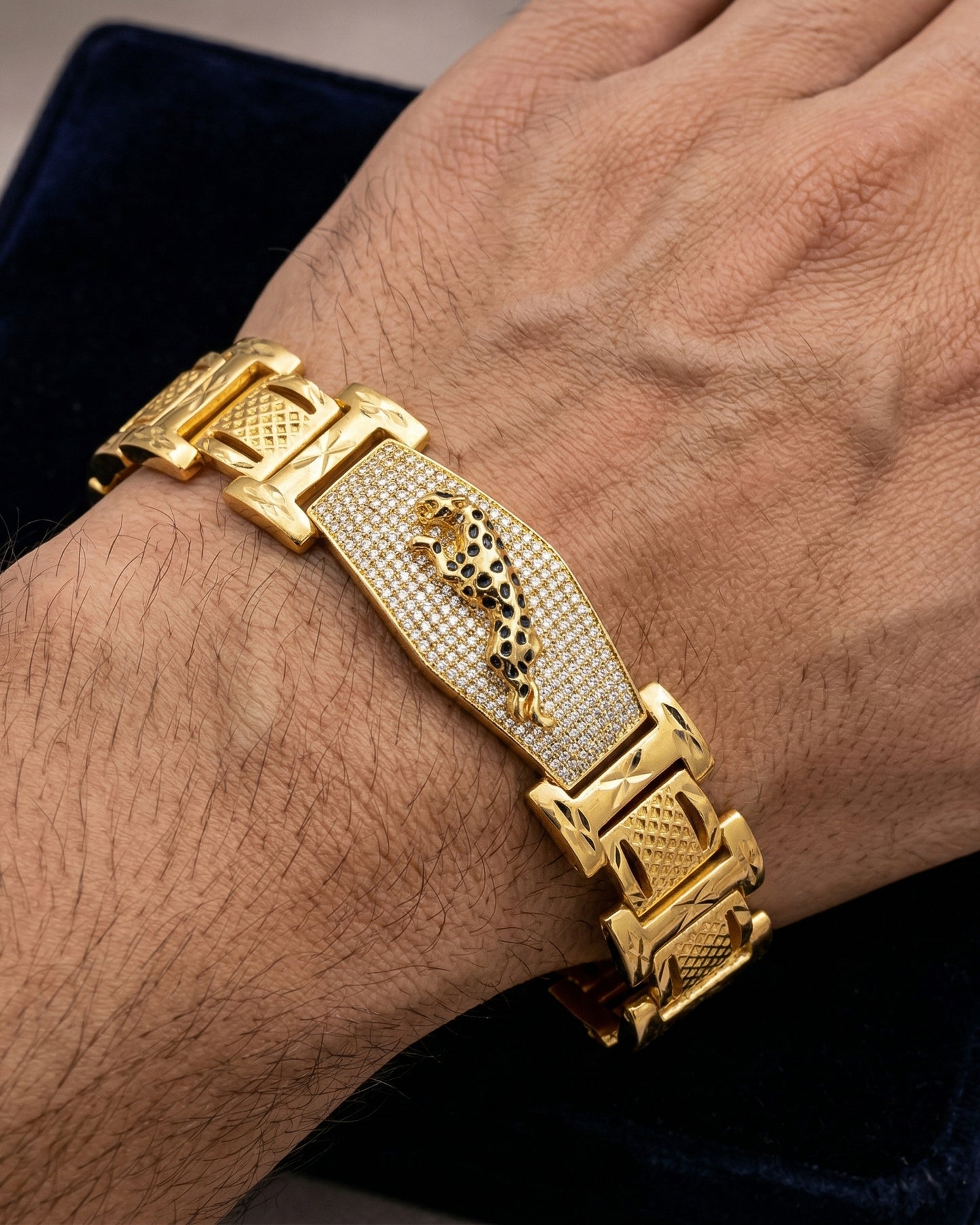 Royal Gold Plated Bracelet with Penther  Design and Diamond-Studded Chevron Links"
